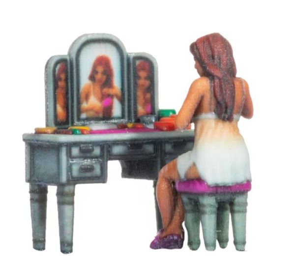 NOC10423 - Woman at 3D makeup table - 1