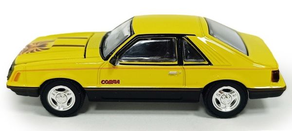 GREEN13370-C - 1979 Ford Mustang Cobra Fastback, yellow, GL Muscle series, still in its original packaging. - 1