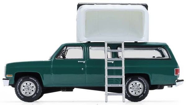 GREEN38080-E - 1990 CHEVROLET Suburban, green, with rooftop tent from THE GREAT OUTDOORS series, still in its original packaging. - 1