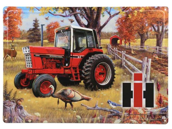 42003 - Embossed metal sign INTERNATIONAL 1086 with wildlife - 42.5x30.5 cm - 1