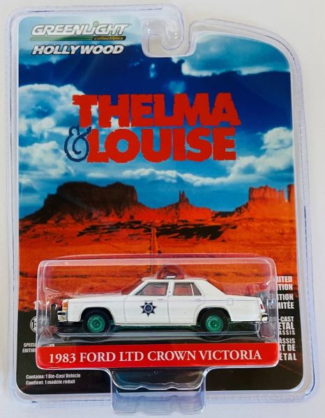 GREEN44945-DVERT - FORD LTD Crown Victoria 1983 green rims patrol car from the THELMA & LOUISE series under blister - 1