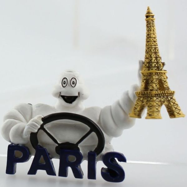 MICHELIN260400 - Magnet Bibendum Michelin who drives with Tour Eiffel dimension 6 x 6 cm - 1