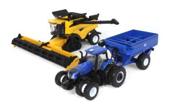 ERT13996 - NEW HOLLAND CR8.90 SamrtTrax combine harvester with 2 headers and NEW HOLLAND T8.410 tractor with J&M grain trailer