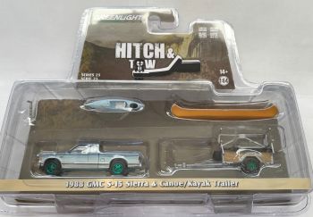 GREEN32250-C_VERT - GMC S-15 Sierra 1988 blue with green rims and HITCH & TOW canoe and kayak trailer in blister pack