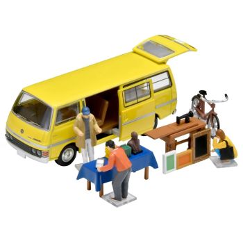 TOM325246 - Flea market with yellow NISSAN Homy Van and accessories